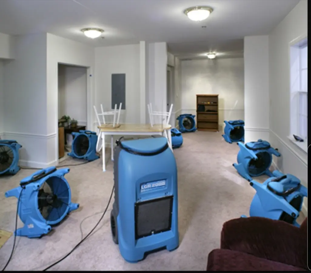 Air movers and dehumidifier setup for Water Extraction & Removal in Johnston